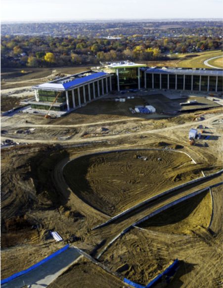 Developer Resources Omaha. Applied Underwriters site (photo by City of Omaha). CNC did a 3D scan of the large egg shape detention basin in the foreground. The data was used by a steel manufacturer to build a metal cover over the basin. It fit exactly first try!